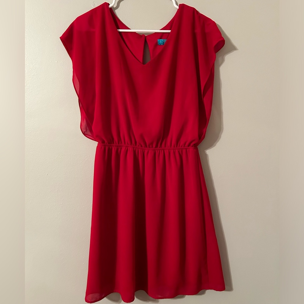 Never Worn Short Woman’s Dress with cinched waist and back slit